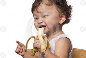 child with banana